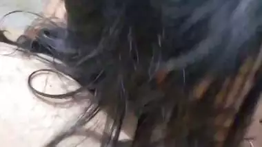 GF with smiling face gives blowjob to boyfriend