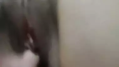 Brown haired cam girl boob pressing and pussy fingering